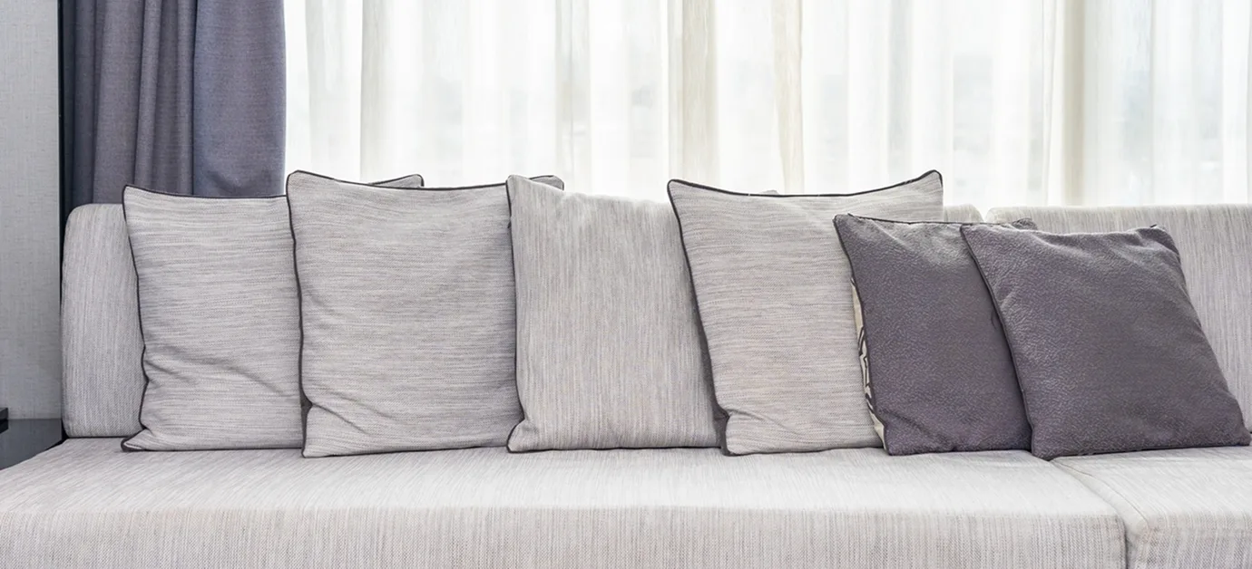 Cleaned fabric furnishings with vacuumed upholstery and washed cushions